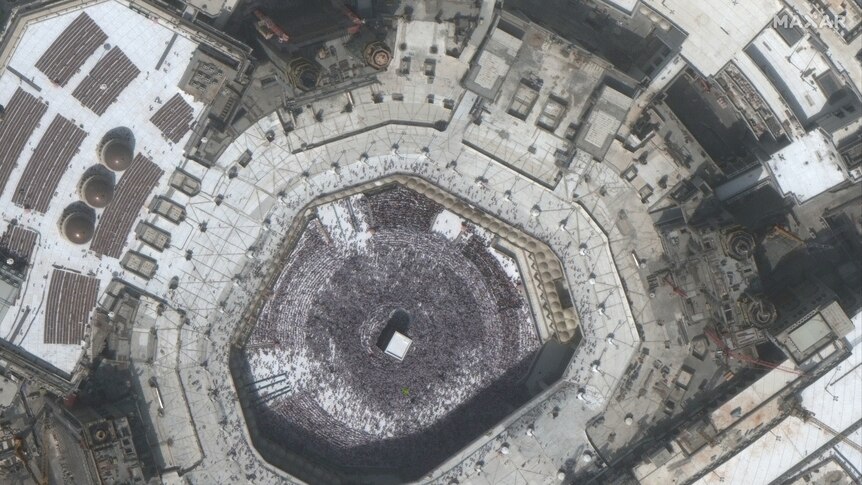 A large congregation is seen around the Kaaba at the Great Mosque in Mecca, February 14, 2020.