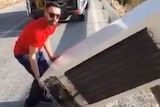 The man was filmed disposing of a fridge off a cliff.