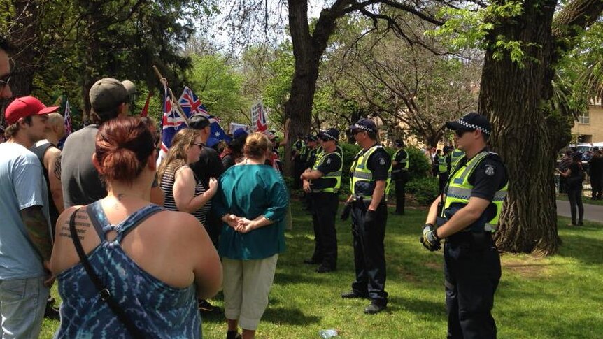 Police guard anti-mosque rally, as two opposing protest groups gather in Bendigo.