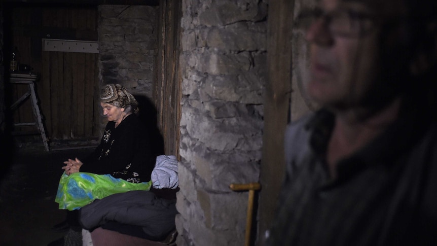 People shelter in a basement in Makiyivk