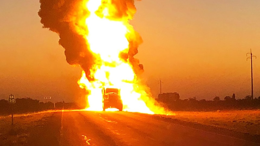 A fuel tanker on fire after it exploded
