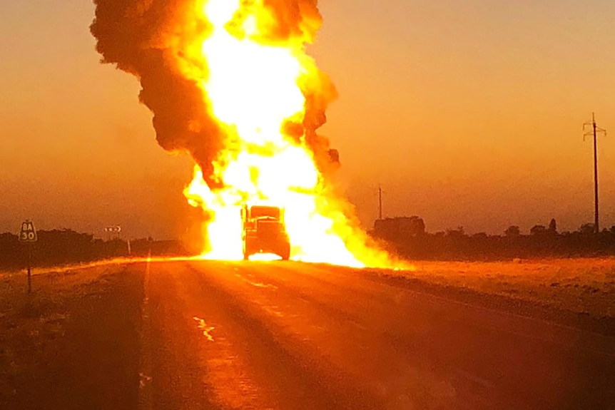 A fuel tanker on fire after it exploded