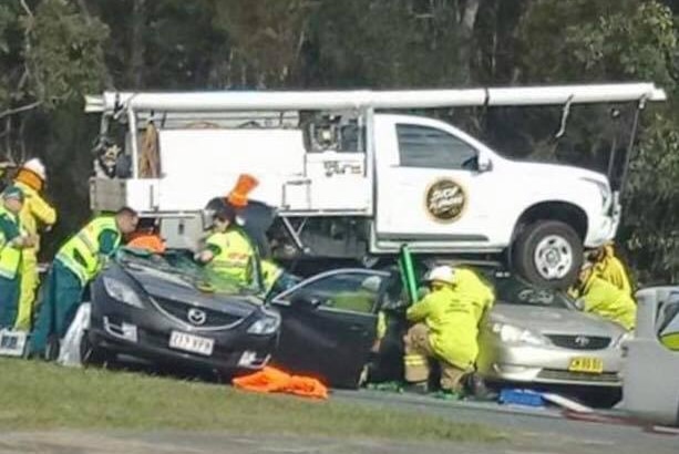 Ute landing on three cars in Caboolture