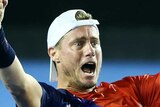 Winning feeling ... Lleyton Hewitt drops to the ground in celebration after beating James Duckworth in straight sets