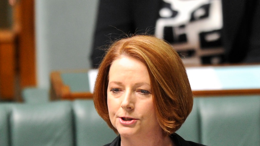 Prime Minister Julia Gillard gestures in Federal Parliament. (AAP: Lukas Coch)