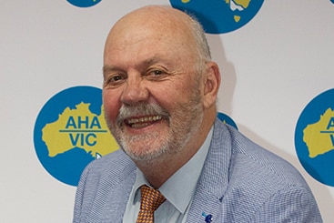 Photo of a smiling man who is the Australian Hotel Association executive board member Ray Sharawara