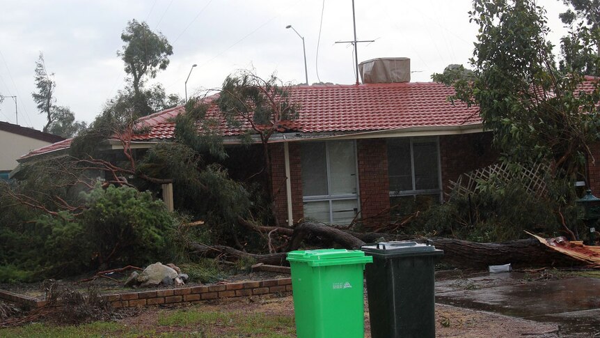 Damage to a house on Waterwitch Street, Carey Park, Bunbury after a tornado ripped through the town 18 August 2014