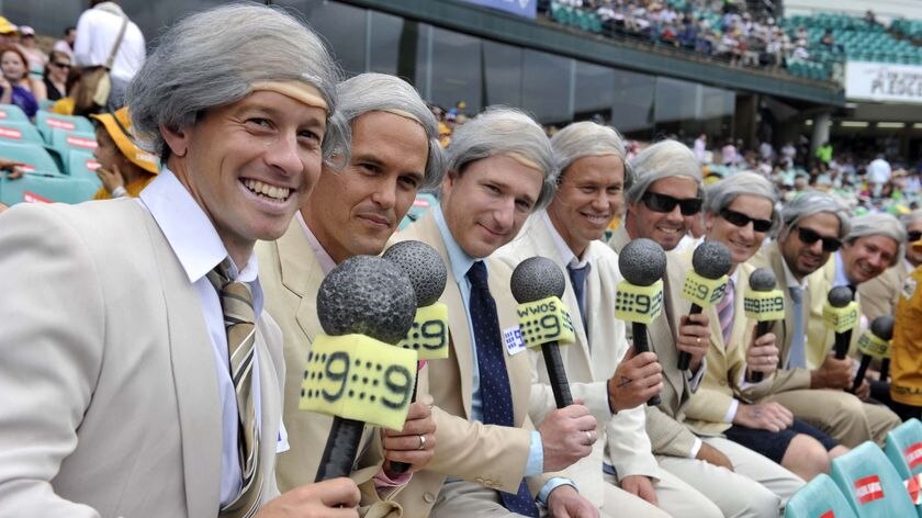 Spectators dressed as former player and current cricket commentator Richie Benaud