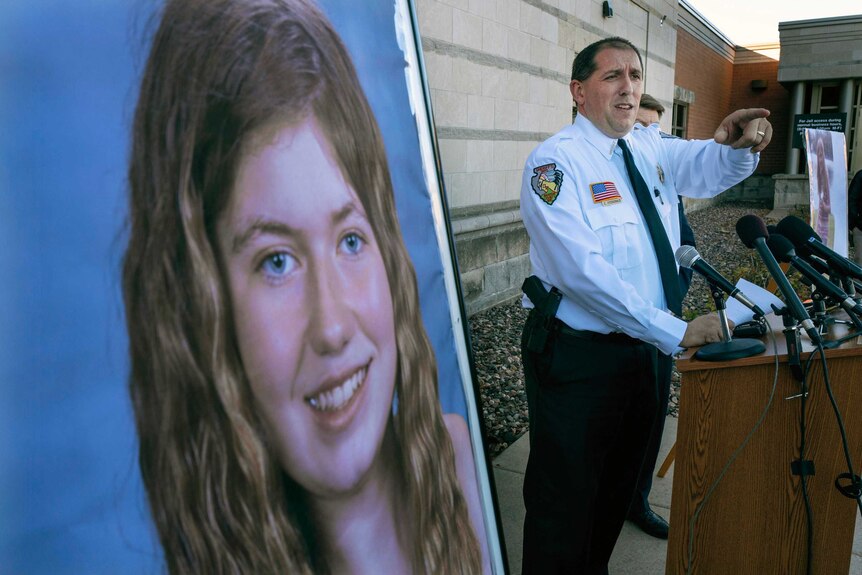 Sheriff Chris Fitzgerald speaks at a press conference next to a picture of Jayme Closs