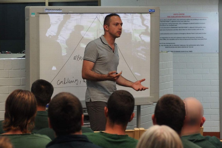 Arman Abrahimzadeh speaking to a group of prisoners at the Mobilong Prison in South Australia.