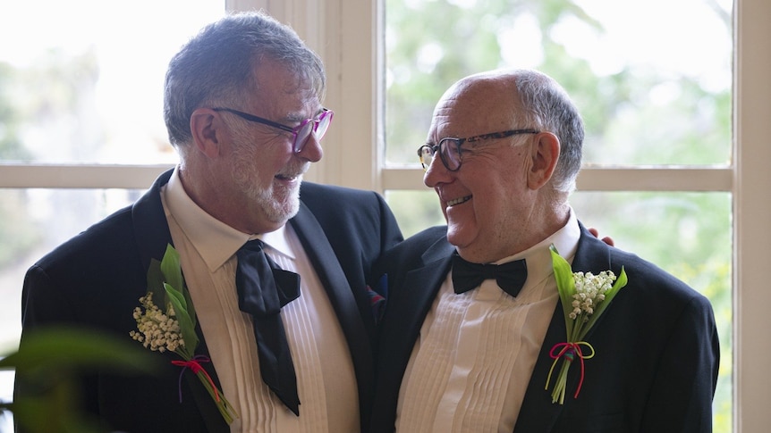 Two middle aged men on their wedding day