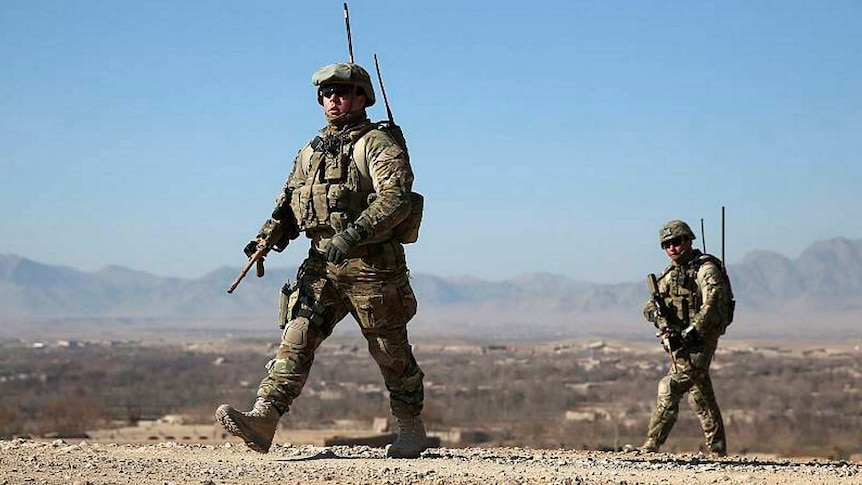 Australian soldiers patrol in Tarin Kot, Afghanistan, in December 2012.