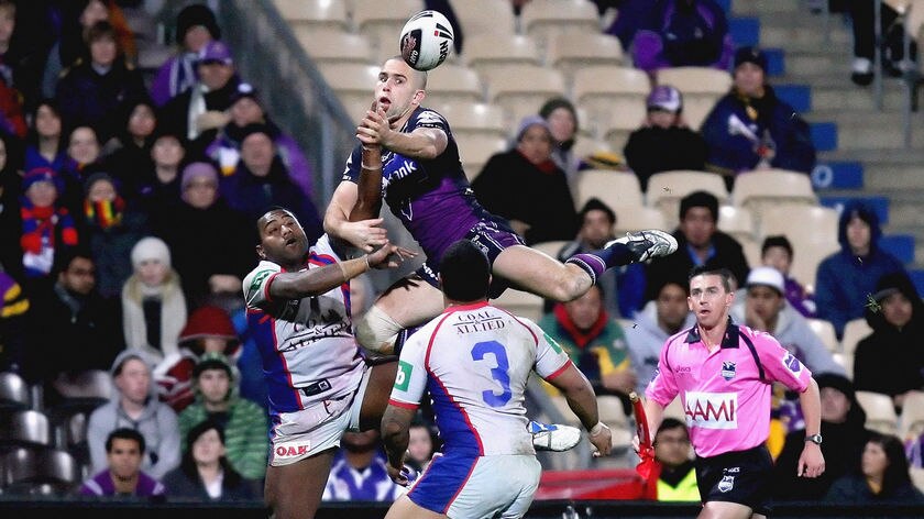 Steve Turner flies for a high ball for the Storm.