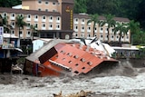 The Hotel Chin shuai lies in floodwater after collapsing during typhoon Morakot