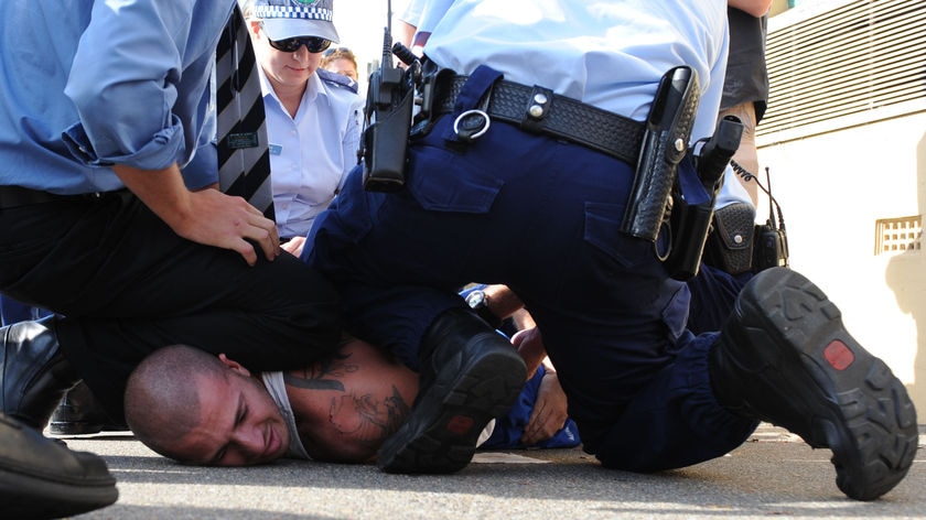 Police arrest Bandido bikie outside court