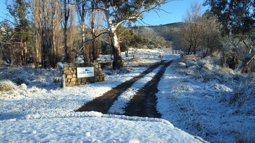 Snow at the Snowy River Cabins at Berridale this morning.