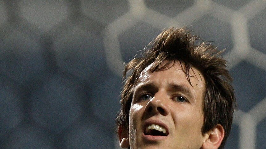 Robbie Kruse reacts to a missed chance against Jeju United.