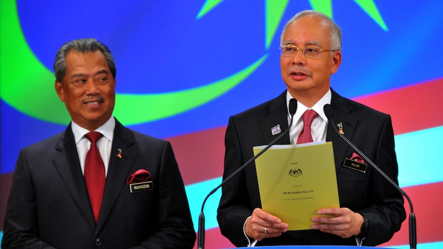 Malaysia's Prime Minister Najib Razak speaks after announcing his cabinet line-up.