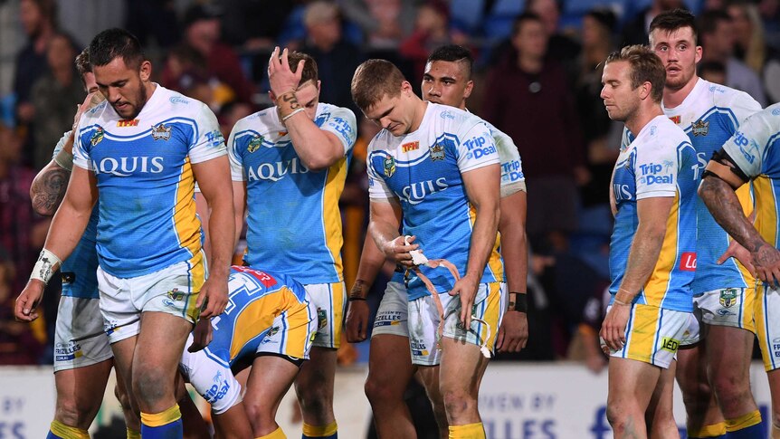 Gold Coast Titans players look dejected following loss to Broncos