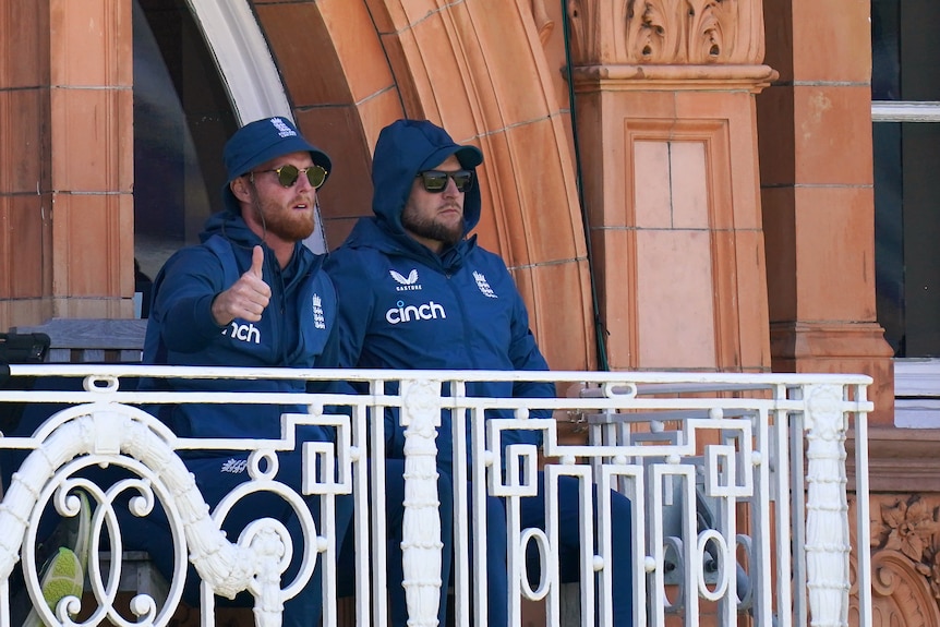 Ben Stokes and Brendon McCullum sit on the Lord's balcony