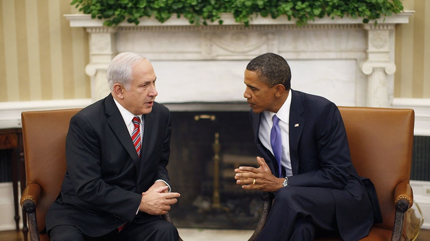Barack Obama and Benjamin Netanyahu talk in the Oval Office