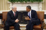 Barack Obama and Benjamin Netanyahu talk in the Oval Office