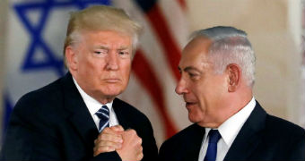 US President Donald Trump shakes hands with Israel's Benjamin Netanyahu