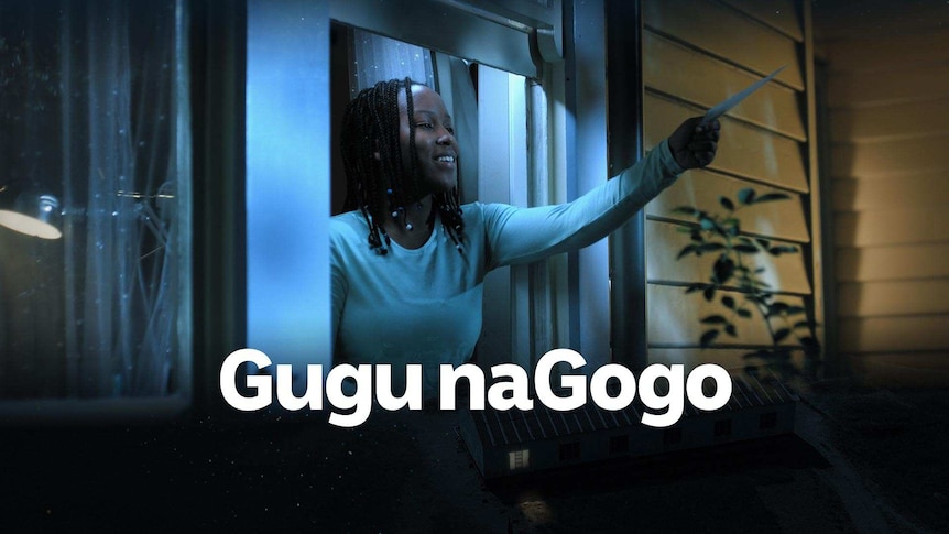 A young girl reaches out of a window holding a paper at night with the program title Gugu naGogo