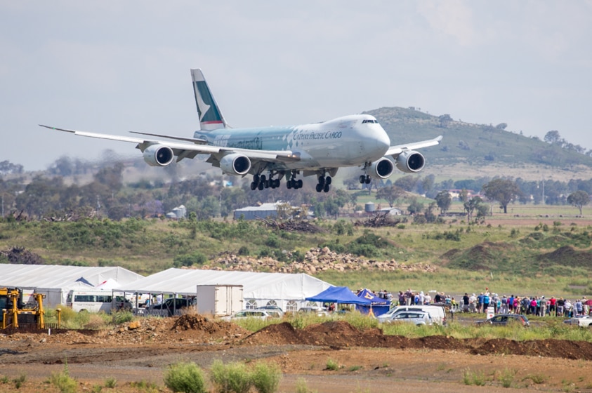 A 747 lands at an airport in Queensland.