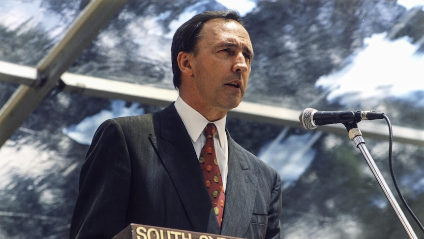Paul Keating speaks into a microphone at a lectern labelled with South Sydney City Council.