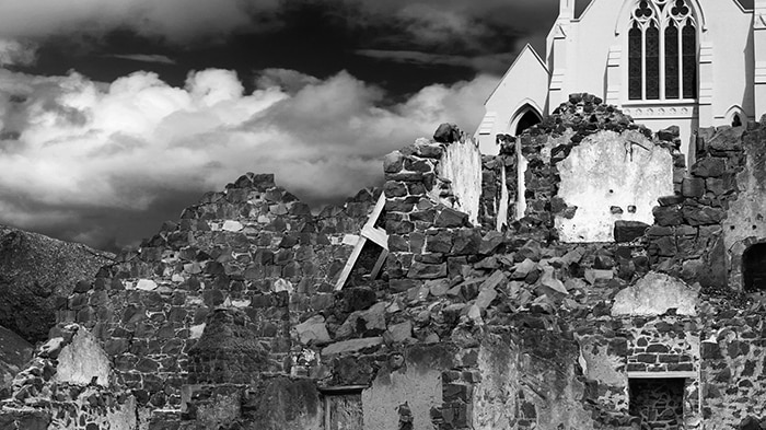 Black and white photographic artwork of layered churches and ruins by artist Hayley Millar-Baker.