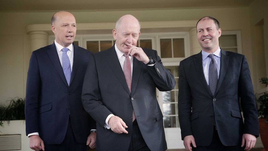 Peter Dutton, Governor-General Peter Cosgrove and Josh Frydenberg smile in front of a house