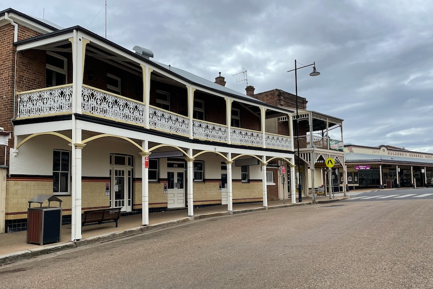 A two storey terrace hotel at the corner of a street in Gulgong 