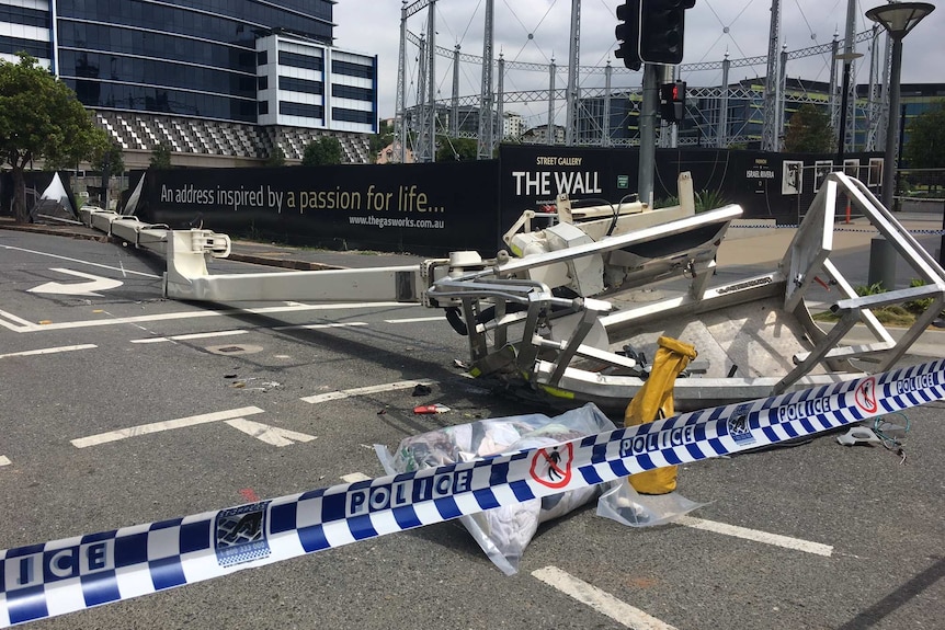 Crane falls over in Brisbane