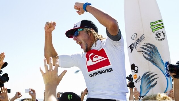 Wright celebrates being $300,000 richer and his climb up the surfing world rankings.
