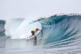 Matt Wilkinson sets up for a high scoring ride in Tahiti