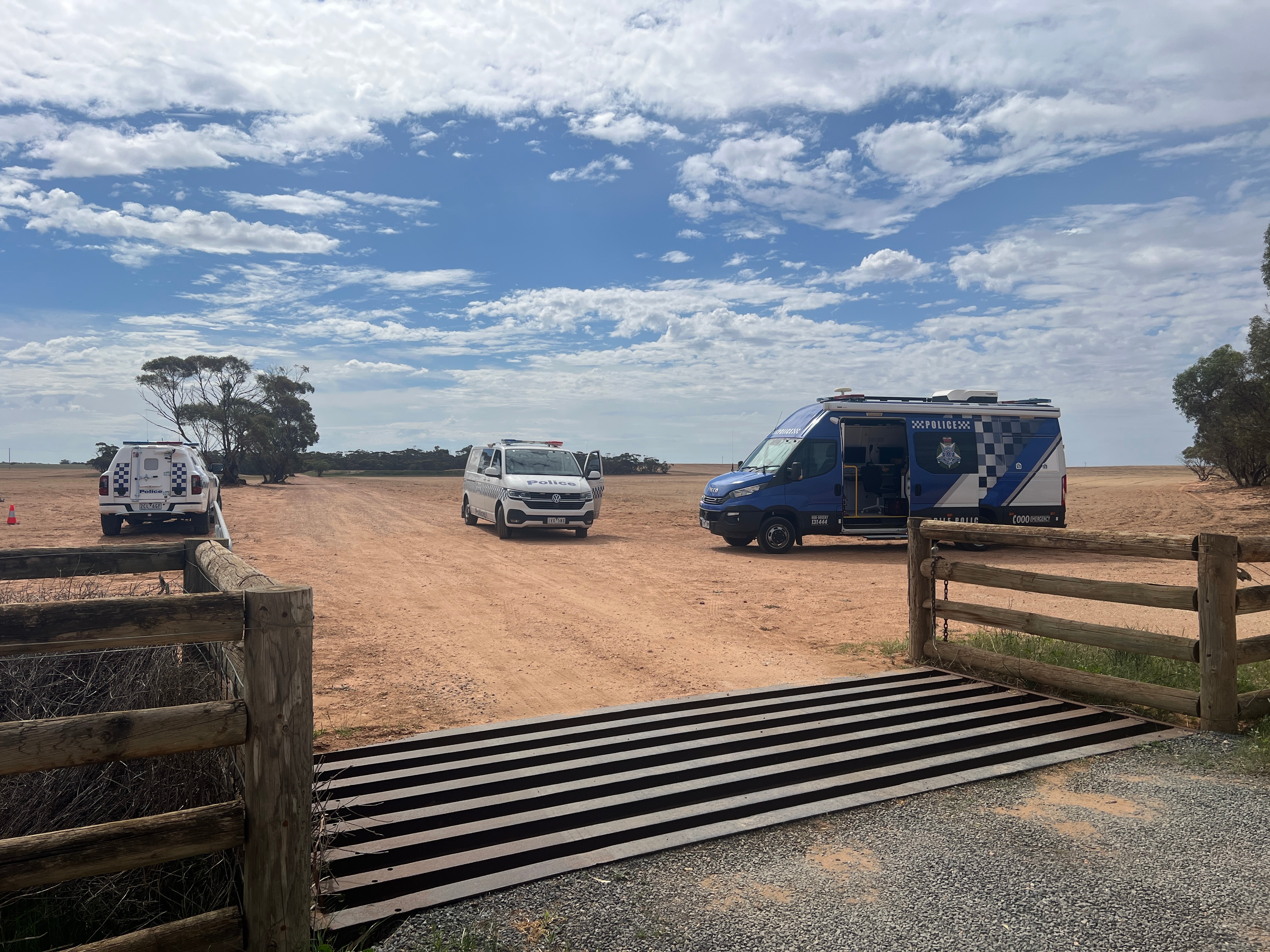 farm with police vehicles on it