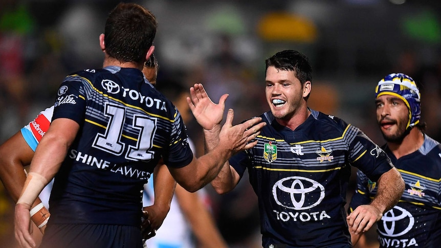 Lachlan Coote and Gavin Cooper celebrate a try against Gold Coast Titans