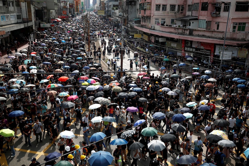 Demonstrators march in Hong Kong