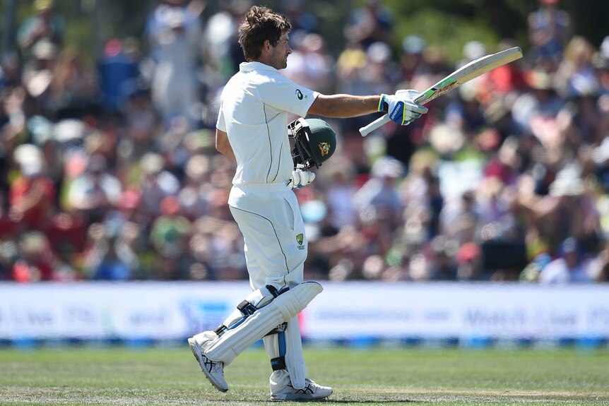 Australian batsman Joe Burns celebrates a century against New Zealand on day two in Christchurch.