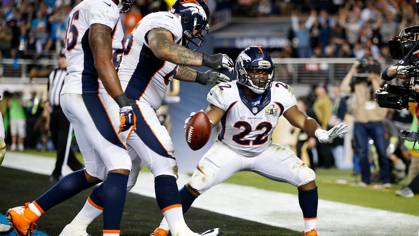 Denver's C.J. Anderson celebrates touchdown with team-mates against Carolina in Super Bowl 50.