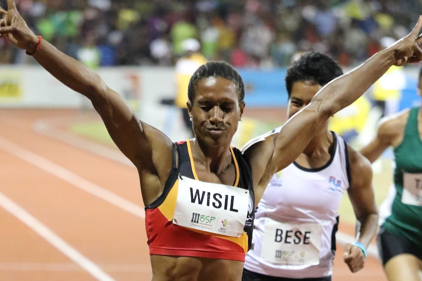 Toea Wisil takes women's 100m gold