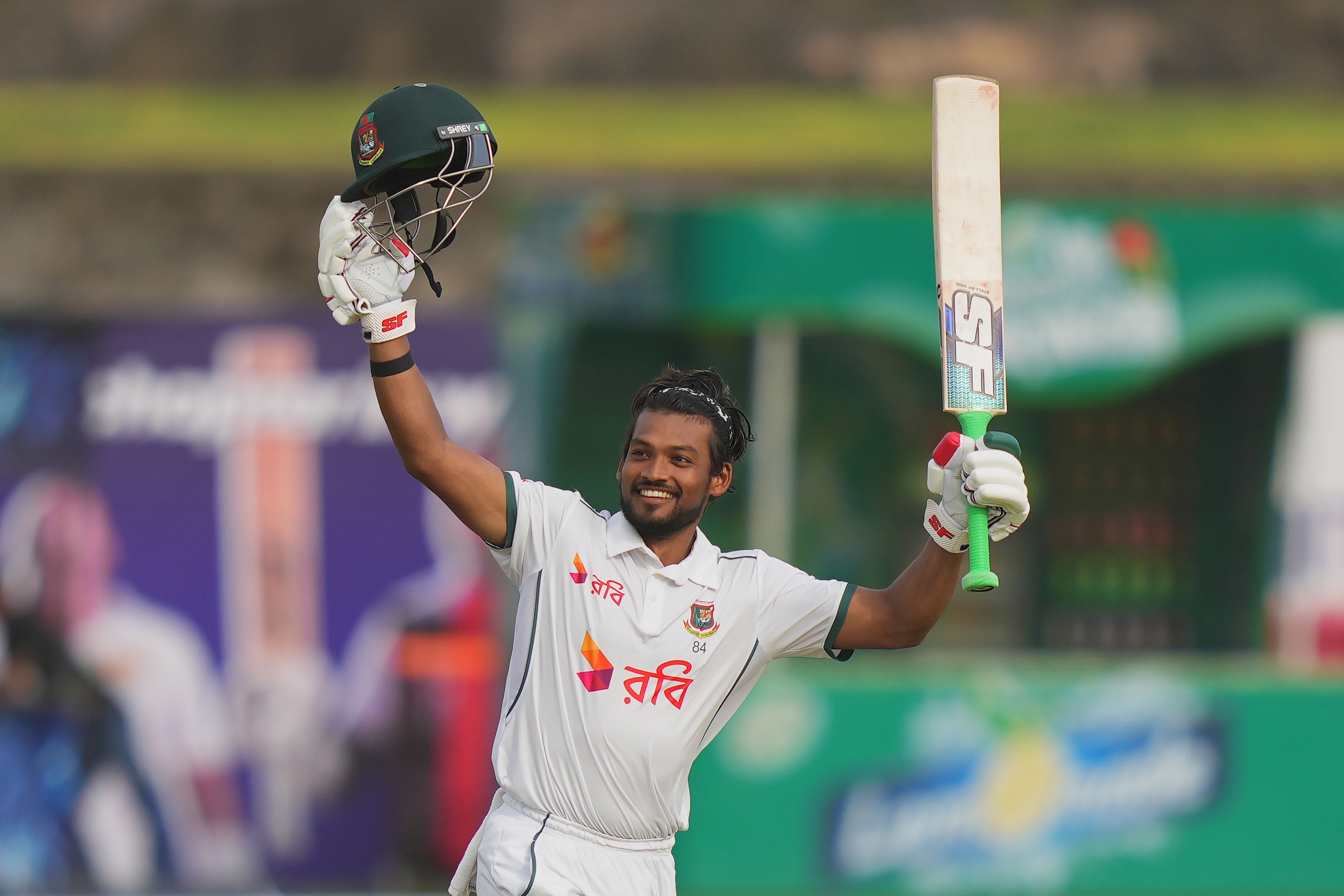 Najmul Hossain Shanto holds up his bat