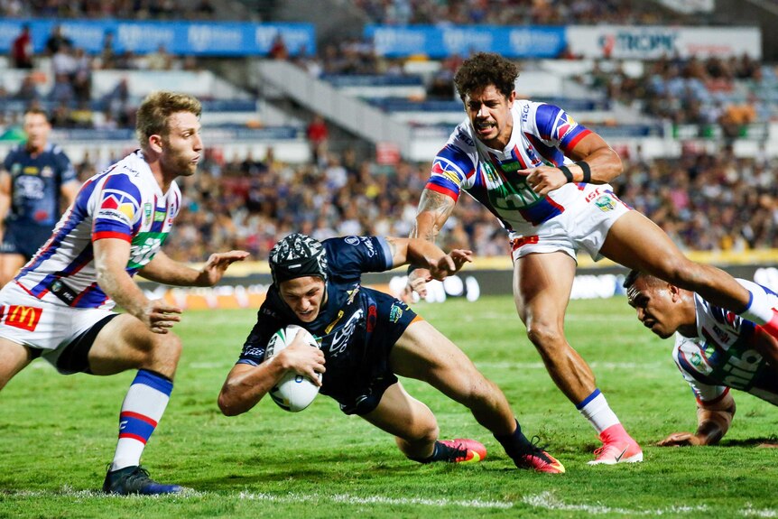 Kalyn Ponga dives in to score against the Knights