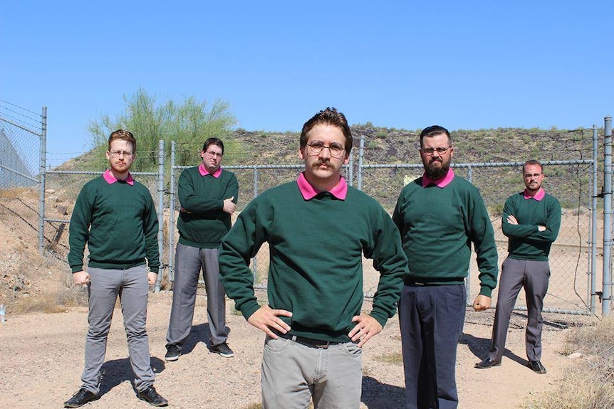Five men in a band all dressed like Simpsons character Ned Flanders