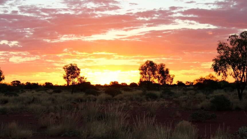 A sunset at the remote community of Kintore, 500km west of Alice Springs.