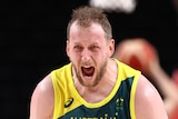 Australian basketball player Joe Ingles shouts during a bronze-medal game against Slovenia at the Tokyo Olympics.
