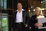 Tony Mokbel and Nicola Gobbo walk away from a Melbourne court.