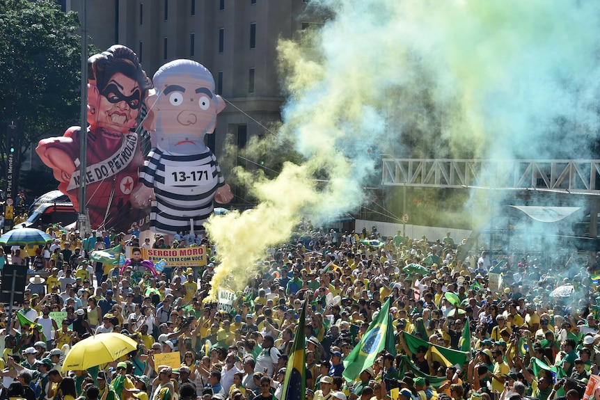Activists supporting the impeachment of President Dilma Rousseff take part in a protest.