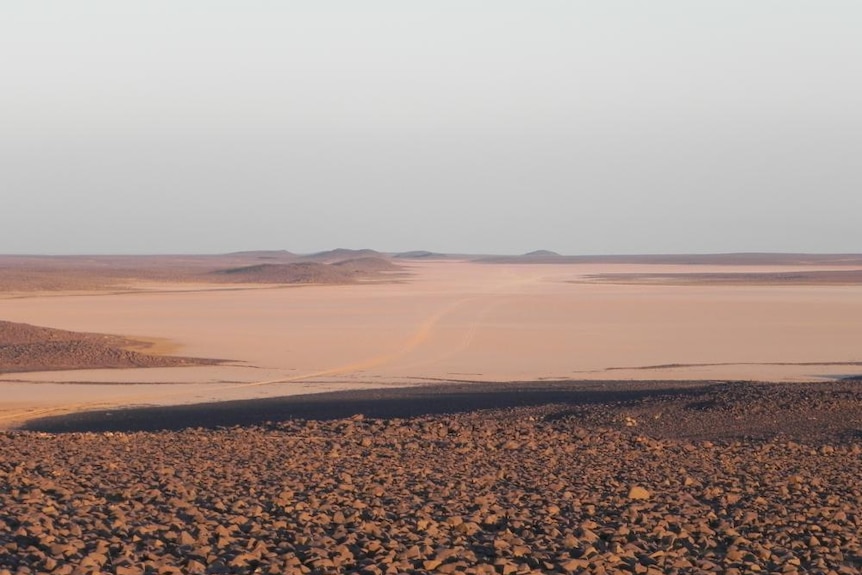 Mud pan Qa' al-Bakhita in Basalt desert